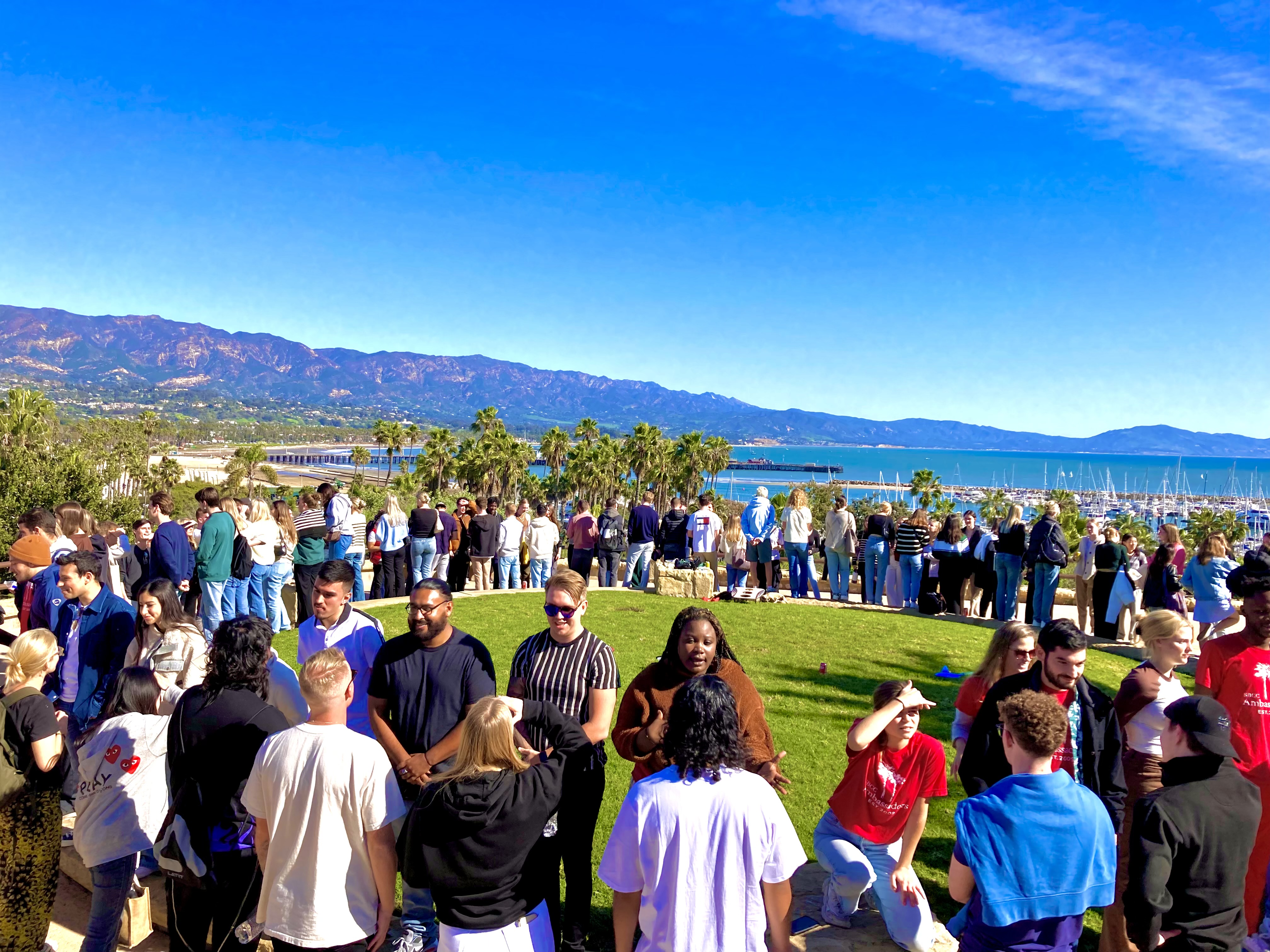 Circle of students around Maxwell Overlook